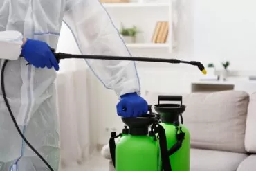 person in virus protective suit stops the coronavirus spread 1